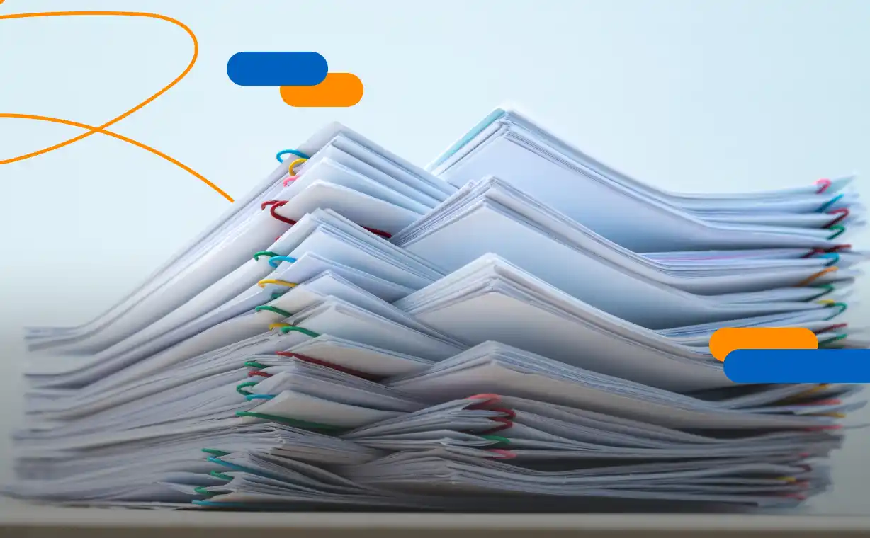 Pile of medical papers representing the digitisation of healthcare centres