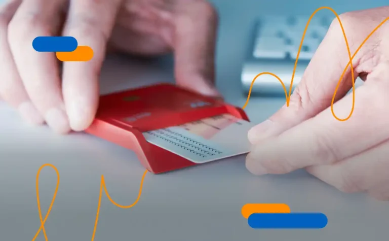 Person using a card reader to activate the electronic ID card and carry out digital procedures securely.