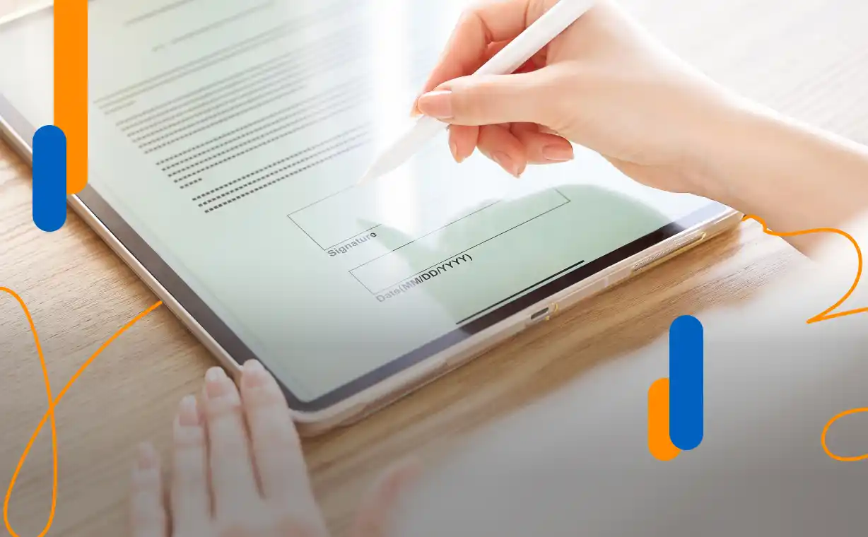 Person using a digital pen on a tablet to sign a document, representing how electronic signatures will be equivalent to handwritten signatures in 2026